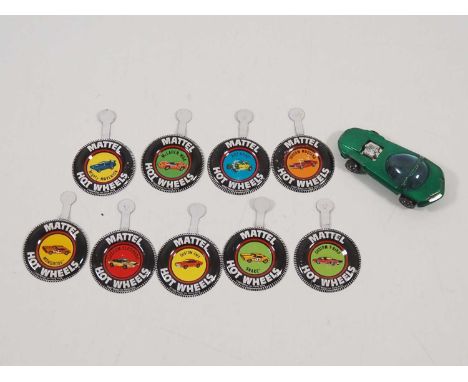 A group of vintage MATTEL Hotwheels Redline tin buttons together with an unboxed 'Silhouette' car - G unboxed (10)