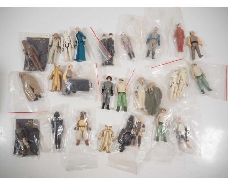 A group of vintage KENNER/PALITOY uncarded Star Wars figures all from the late 1970s/early 1980s to include a 1977 Chewbacca 