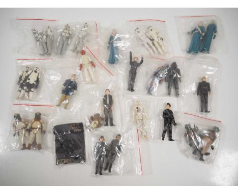 A group of vintage KENNER/PALITOY uncarded Star Wars figures all from the late 1970s/early 1980s to include a 1977 Darth Vade
