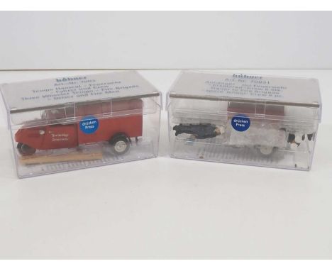 A 1:32 scale HUBNER 7003/70031 Fire Brigade set comprising a 3-wheeler Tempo, trailer and crew - VG/E in VG boxes (2)