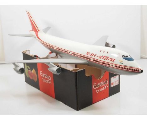 A large scale travel agents model of a Boeing 747-100B in Air India livery 'Emperor Ashoka' - Supplier label for 'Airlines Pu