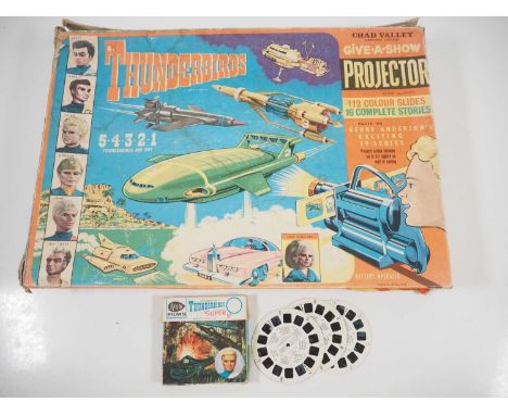 A vintage CHAD VALLEY Gerry Anderson's 'Thunderbirds' Give-A-Show Projector with colour projection slides, appears complete i