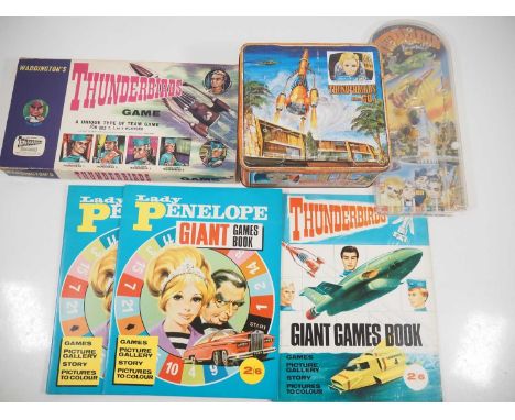 A group of Gerry Anderson's 'Thunderbirds' themed games and books etc, comprising a Waddington's game (near complete), three 