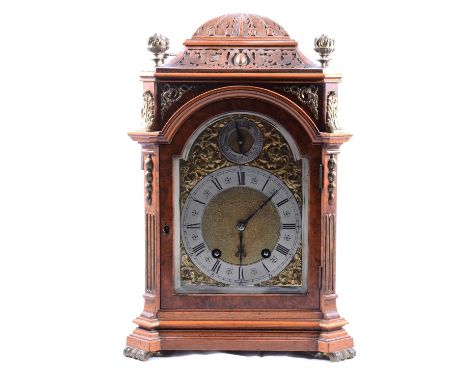 Burr walnut mantel clock, the case with gilt metal mounts, 14cm arched brass dial with silvered chapter ring and cast spandre