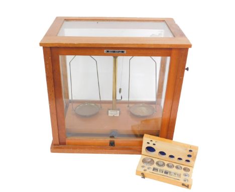 A set of W &amp; J George &amp; Becker Ltd gold scales, together with a box of weights, in a Griffin &amp; George Ltd case, 4