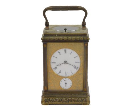 A late 19thC French brass cased repeater carriage clock, the gilt dial fascia with floral and foliate engraving, circular ena