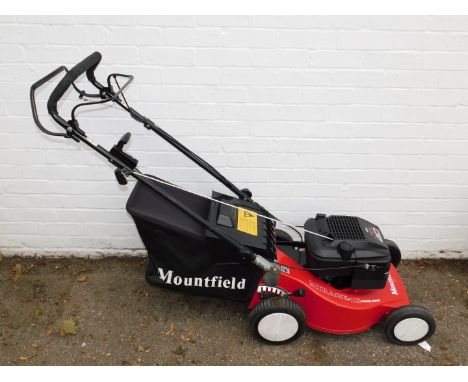 A Mountfield Mirage 18 power drive petrol rotary driven lawnmower.