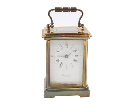 A French brass carriage clock, dial bearing Roman and Arabic numerals, single barrel movement, For Bornand Freres, Mont Belia