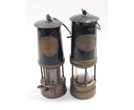 A Thomas &amp; Williams Cambrian miner's lamp, type No 5, no 1635, 27.5cm H., together with a miner's lamp by The Protector L