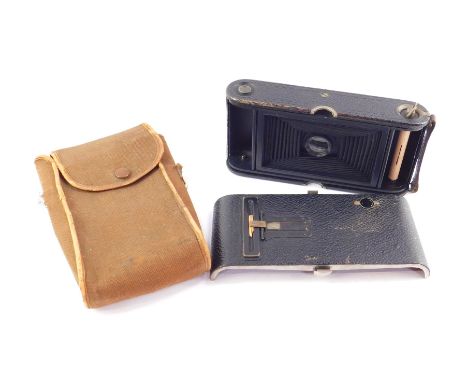 A Kodak Autographic No 3A folding pocket camera, cased, together with a Kodak portrait attachment No 5. (2)