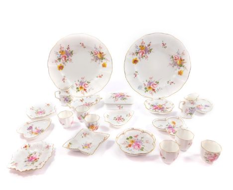 Royal Crown Derby porcelain decorated in the Derby Posies pattern, including a pair of cream jugs, six egg cups, trinket dish