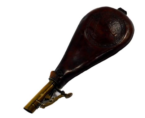 A 19thC brass and leather shot flask, embossed with a hunting dog pursuing pheasants in a field, 22cm H.