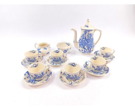 An early 20thC Royal Worcester Regency ware part coffee service, decorated in blue and white with a dragon pattern, comprisin