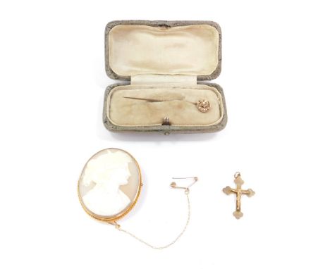 A 9ct gold and shell cameo brooch, bust portrait of a lady, with safety chain as fitted, together with a 9ct gold crucifix pe