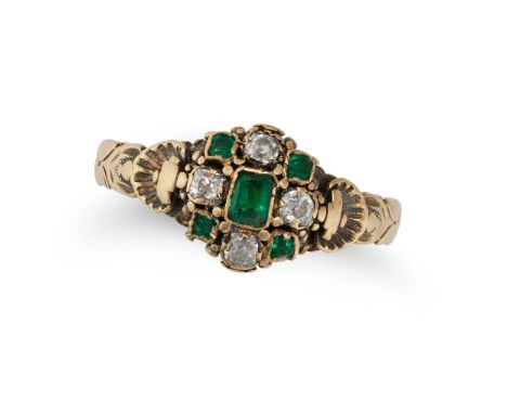 AN ANTIQUE EMERALD AND DIAMOND RING in yellow gold, set with a cushion cut emerald in a cluster of old cut diamonds and step 