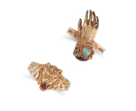 NO RESERVE - TWO VINTAGE GEMSET RINGS in 9ct yellow gold, comprising a ring designed as a lion holding a round cut garnet in 