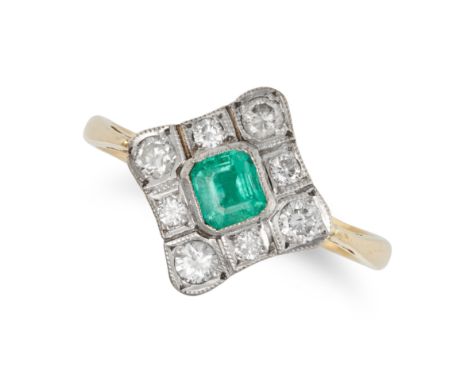 AN EMERALD AND DIAMOND DRESS RING in 18ct yellow gold, set with an octagonal step cut emerald in a border of round brilliant 