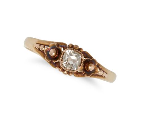 AN ANTIQUE DIAMOND RING in yellow gold, set with an old cut diamond, the shoulders accented with goldwork flowers, no assay m