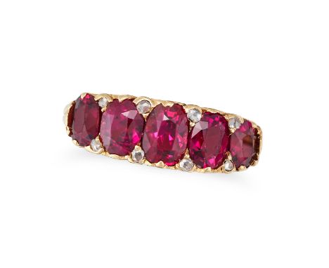 AN ANTIQUE UNHEATED RUBY FIVE STONE RING in yellow gold, set with five cushion cut rubies all totalling 3.0-3.5 carats, accen