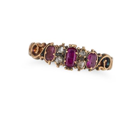 AN ANTIQUE RUBY AND DIAMOND RING in yellow gold, set with three cushion cut rubies accented by rose cut diamonds, no assay ma