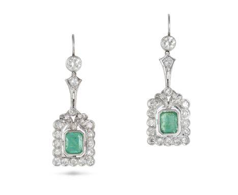 A PAIR OF EMERALD AND DIAMOND DROP EARRINGS in white gold, each set with an octagonal step cut emerald in a border of single 