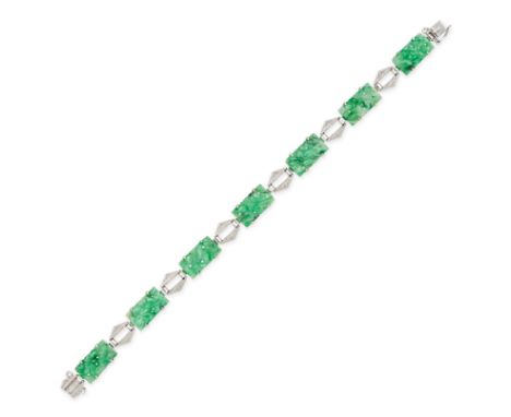 A JADEITE JADE BRACELET in 9ct white gold, designed as carved sections of jadeite jade with alternating openwork links, stamp