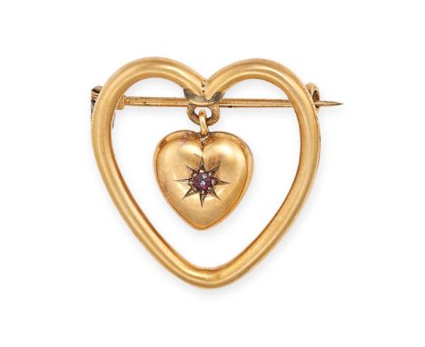 AN ANTIQUE RUBY HEART BROOCH in yellow gold, designed as an openwork heart, suspending a heart shaped pendant set with a roun