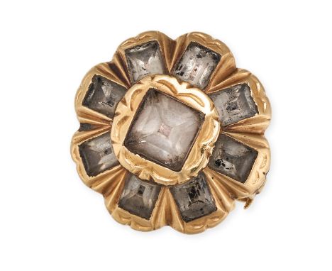 AN ANTIQUE ROCK CRYSTAL CLUSTER RING in yellow gold, set with square and rectangular step cut rock crystals, no assay marks, 