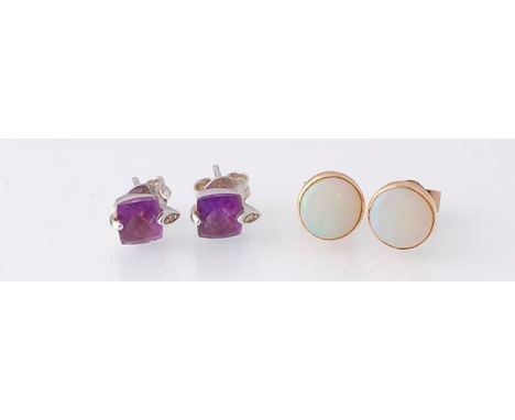 A pair of 9ct gold and opal stud earrings with post backs together with a pair of white gold and amethyst earrings with post 