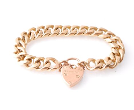 An Edwardian 9ct gold kerb linked bracelet chain adorned with heart padlock bearing Birmingham hallmarks for 1908, sponsors m