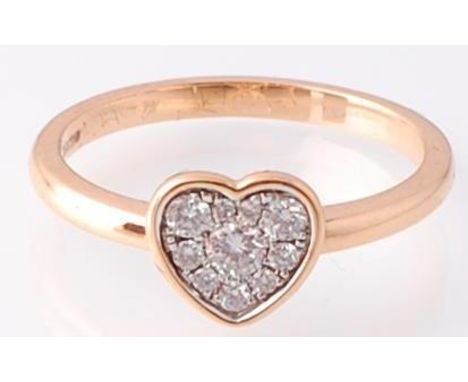 An 18ct rose gold and diamond ring. The pave set diamonds within a heart setting over plain shank. Total weight 2.76g / Size 