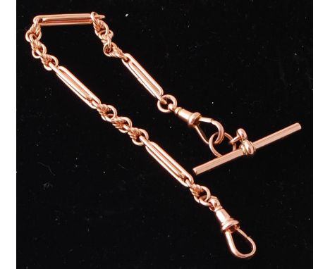A Victorian 19th century rose gold 9ct long bar and curb link bracelet chain with t-bar and lobster clasp. Total weight 16.71