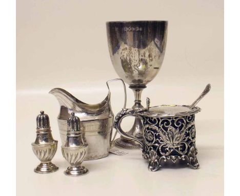 Silver goblet, silver cream helmet, silver mustard pot and two pepper shakers. "Condition report: see terms and conditions"