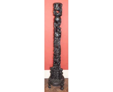 Heavily carried African hardwood standard lamp. "Condition report: see terms and conditions"