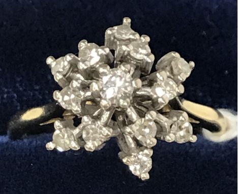 An 18 carat gold and diamond set cluster ring with thirteen stones, Size N/O, 4.4 g overall, together with a Forever Starligh