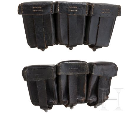 Zwei einzelne Patronentaschen für den Karabiner 98 (K 98)  Eine aus oberseitig gekörntem Leder mit Aluminiumbeschlägen, vs. s