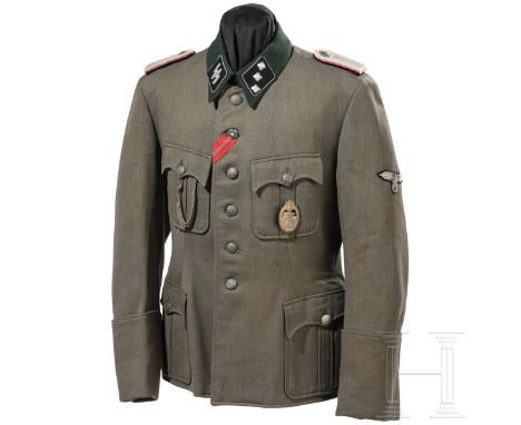 Feldbluse M 36 eines Untersturmführers der SS-Panzereinheiten  Eigentumsstück aus feldgrauer italienischer Gabardine mit dunk