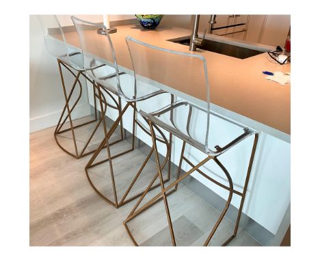 From the Gabby King collection, a set of three acrylic Bar and Counter Stools. The Trailblazer in Transitional Design At Gabb