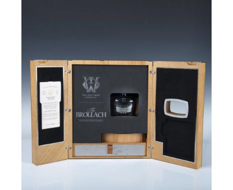 The Irish whiskey decanter, presented in a wooden case with engraved metal labeling. Safely stored in two locked cases secure