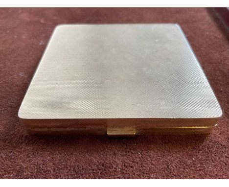 A 9ct yellow gold compact of square section with engine turned decoration and internal mirror, 7 x 7cm, 115g, sold with recei