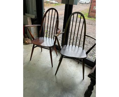 A pair of Ercol mid century Quaker bow back dining chairs with elm seats, unmarked and without labels, seat height 43cm.Dimen