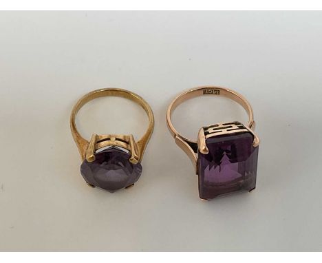 A 14ct yellow gold amethyst dress ring, size L 1/2, approx. 7.1g, and a yellow metal dress ring, size L, approx. 4.9g (2) 