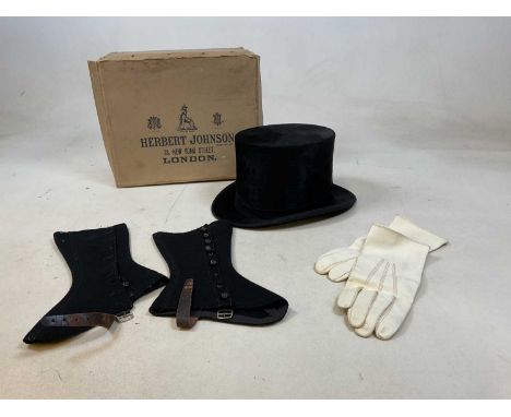 A Moss Bros top hat, size 7 1/4 with a Herbert Johnson hat box, a pair of woollen button sided spats and a pair of leather gl
