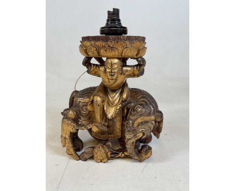 A carved gilded hardwood elephant lampDimensions: Height 30cm
