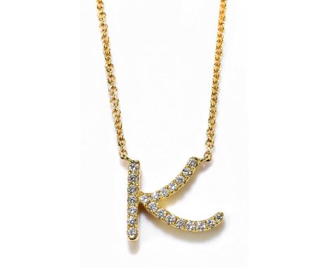 DAVID ROBINSON; an 18ct yellow gold trace chain, suspending a diamond set pendant with the initial 'K, chain length 44cm, app