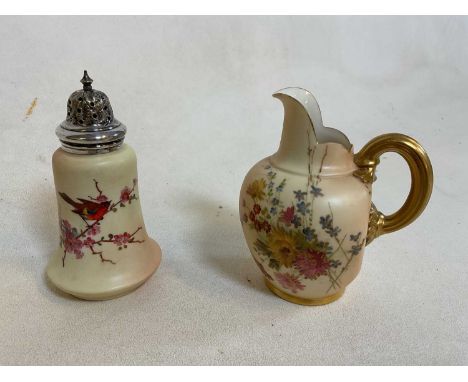 ROYAL WORCESTER; two pieces of blush ivory, comprising a jug and a sugar sifter.Dimensions: Height: 15cm