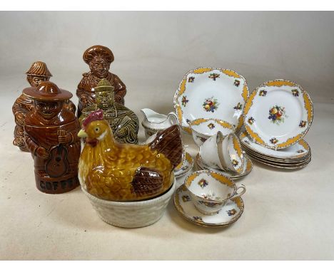 A set of vintage figurative Sadler storage jars, comprising tea, coffee, flour and sugar, a ceramic chicken egg holder and a 