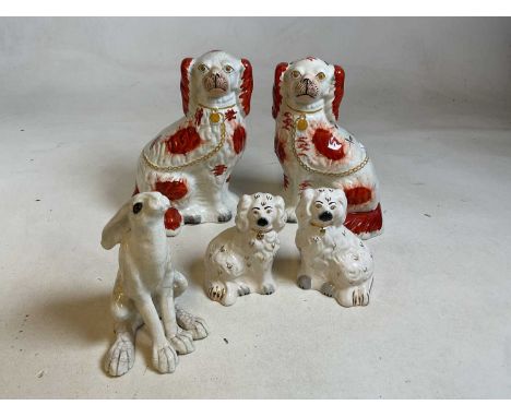 A pair of 19th century Staffordshire dogs, height 28cm (af), a pair of Beswick dogs, height 14cm and a ceramic raku style har