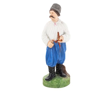 A RUSSIAN PORCELAIN FIGURE OF A MALOROSS WITH A PIPE, FROM THE "PEOPLE OF RUSSIA" SERIES, GARDNER PORCELAIN FACTORY, MOSCOW, 