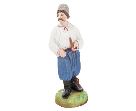 A RUSSIAN PORCELAIN FIGURE OF A MALOROSS WITH A PIPE, FROM THE "PEOPLE OF RUSSIA" SERIES, GARDNER PORCELAIN FACTORY, MOSCOW, 